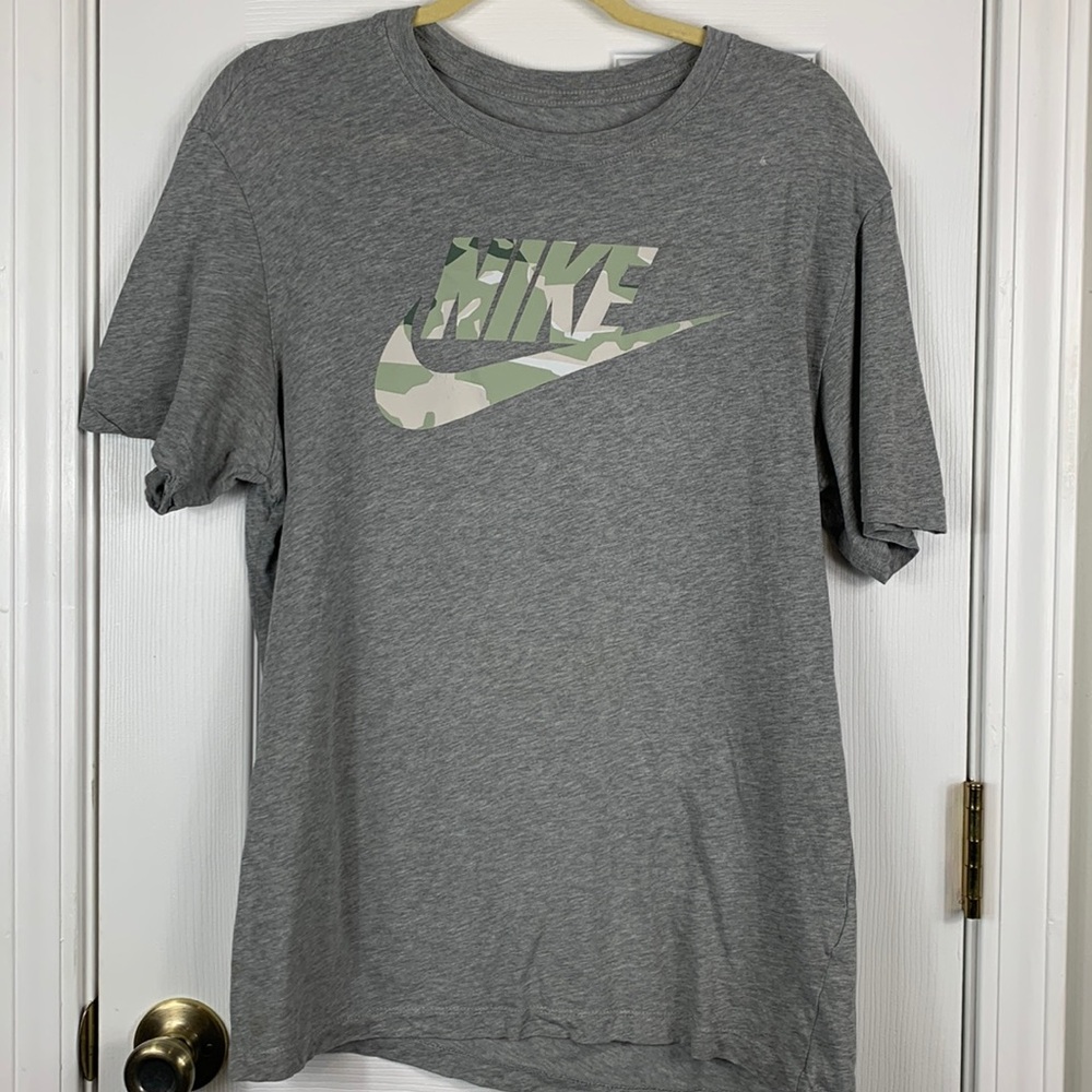 The Nike Tee heather grey short sleeved tee shirt size medium. Camo lettering